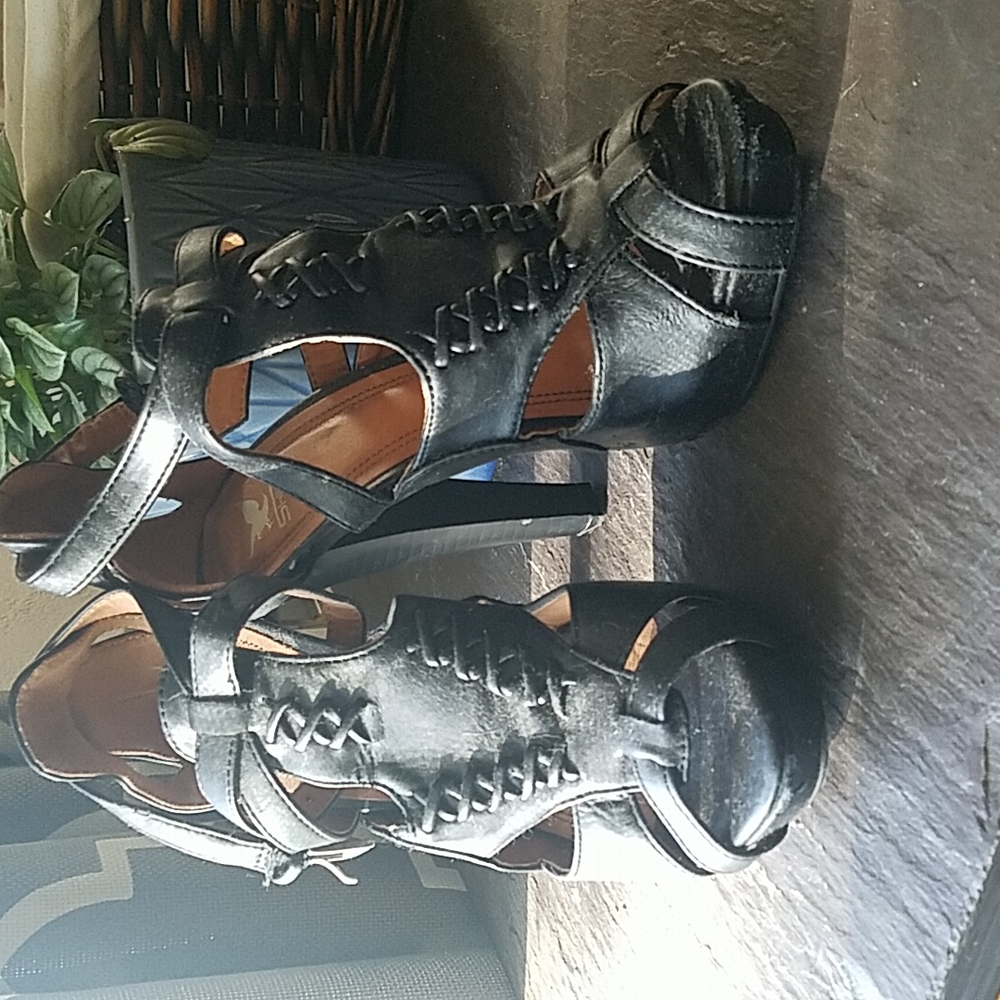 Black strappy high heels
